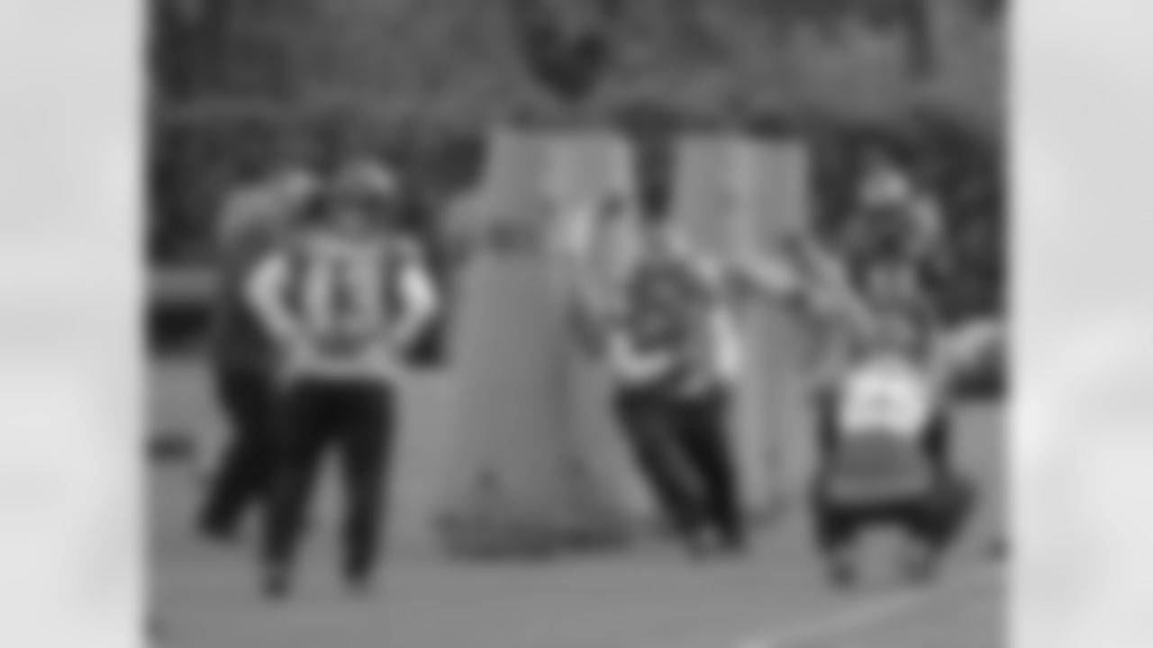 Running backs practice cutting through traffic