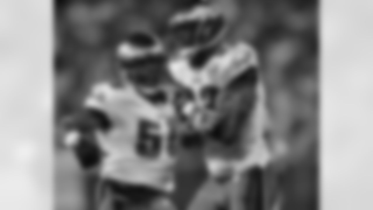 DE Trent Cole and DE Jevon Kearse celebrate a sack for the defense