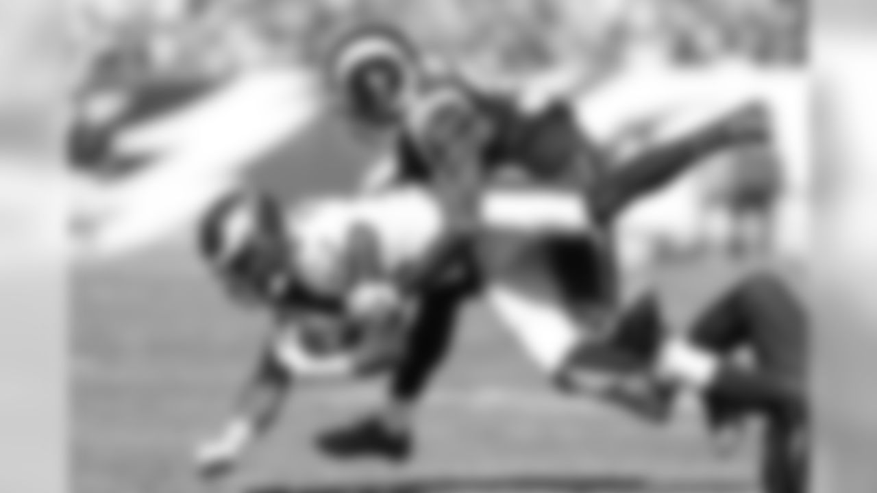 WR Jeremy Maclin getting tackled after a big gain