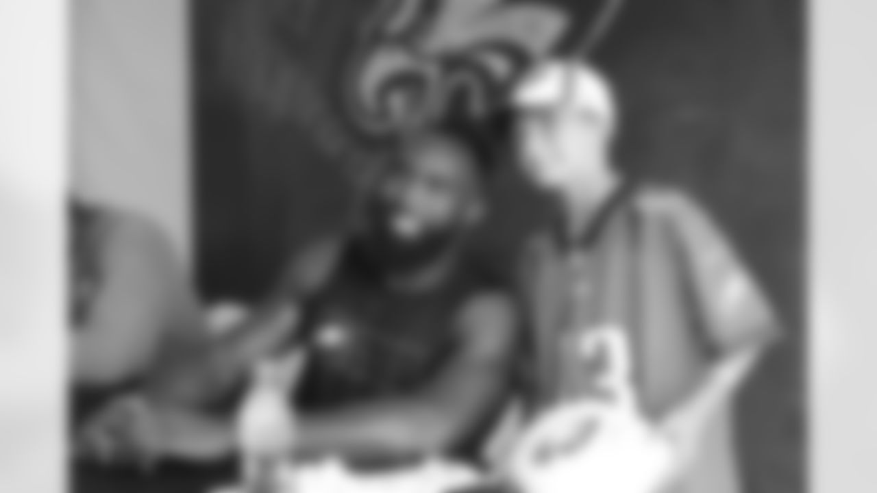 S Malcolm Jenkins poses for photos