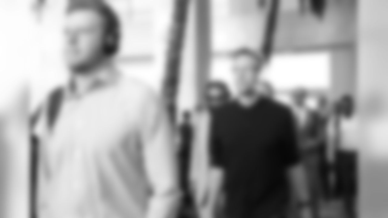 Nick Foles and the Eagles walking through the hotel in Tampa