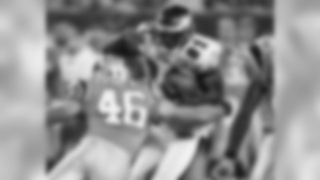 WR Jason Avant is met by a Panthers defender