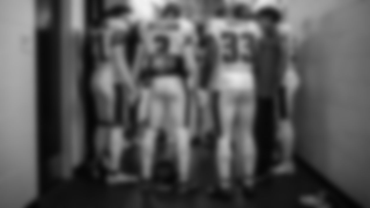 The defensive backs before taking the field