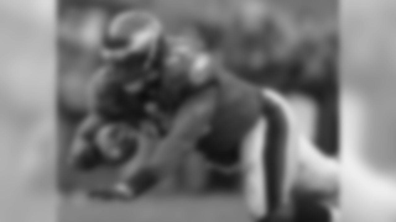 FB Leonard Weaver falls forward