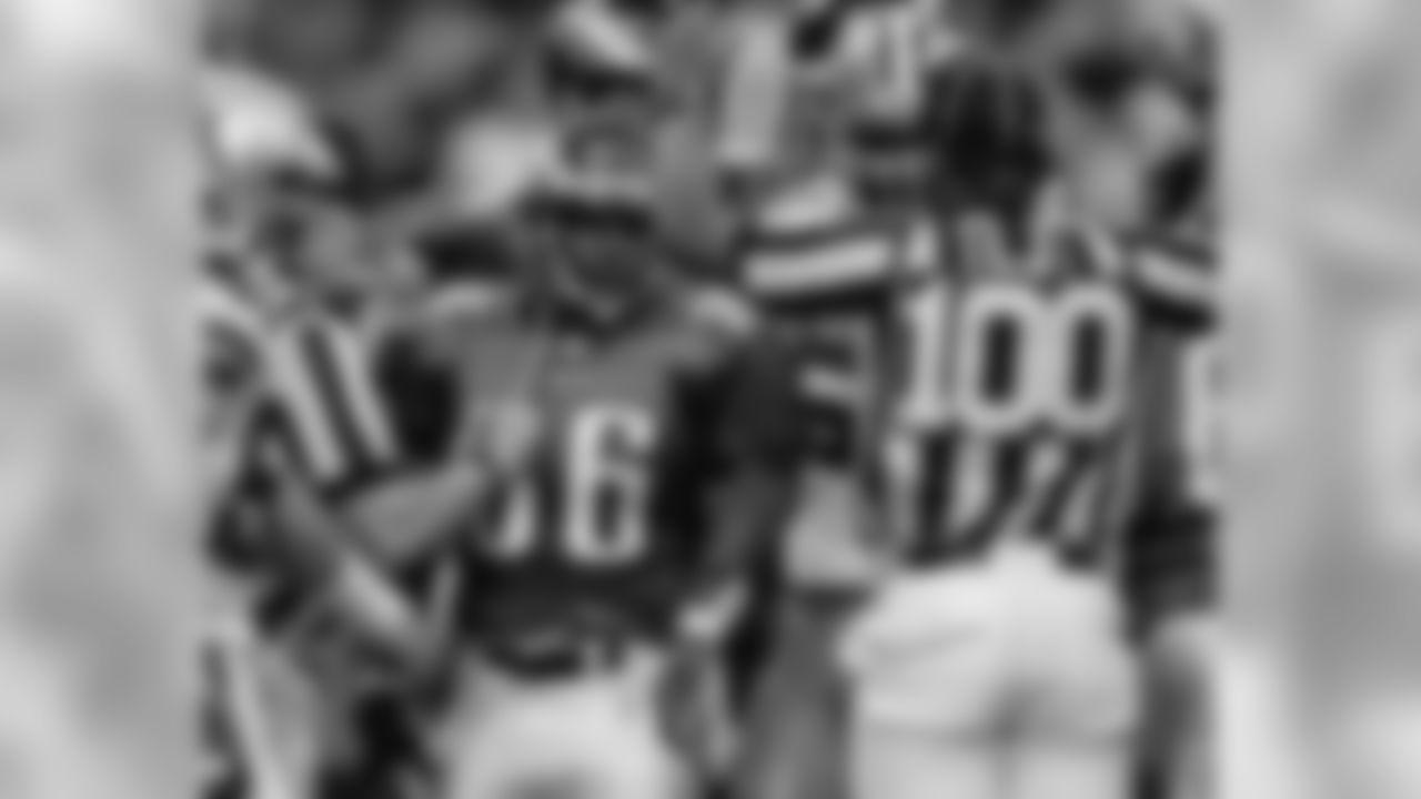 RB Brian Westbrook watches as official signal