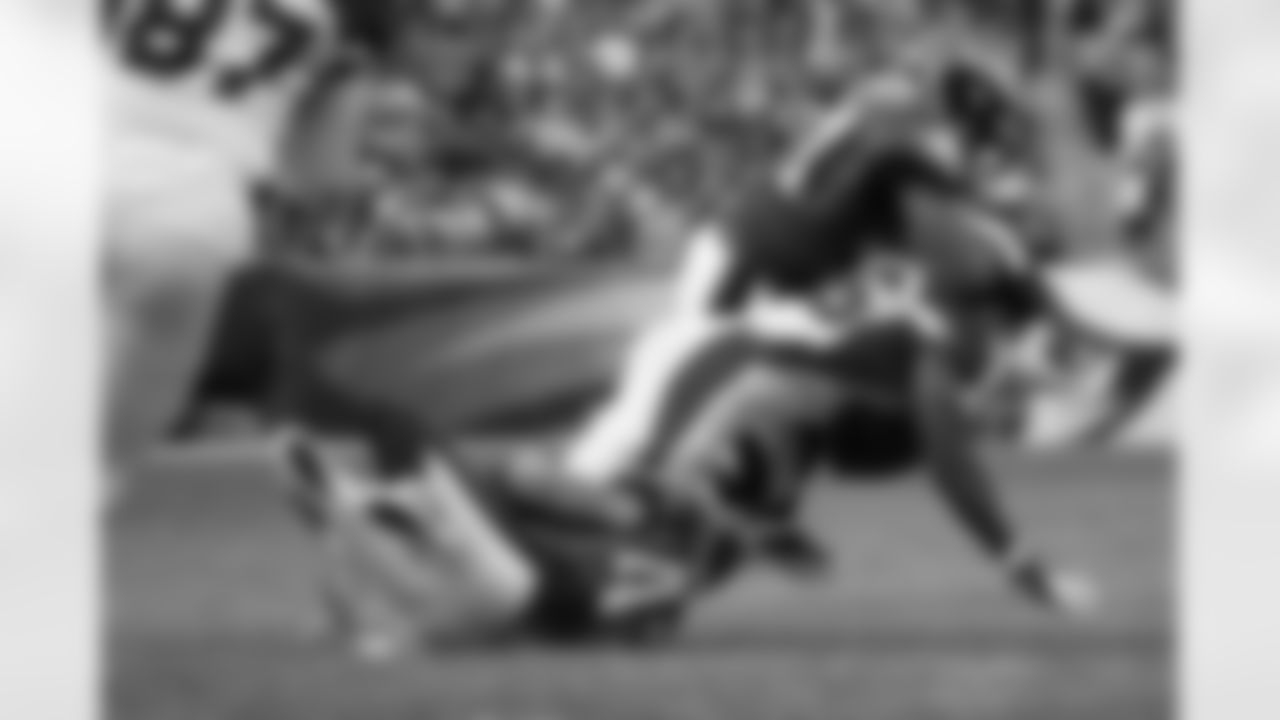 The Defense wraps up the ball carrier