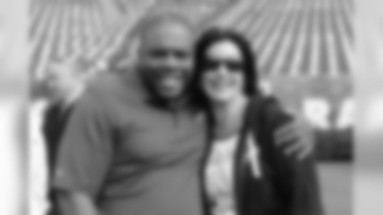A couple on the field before the week nine game between the Philadelphia Eagles and Oakland Raiders.