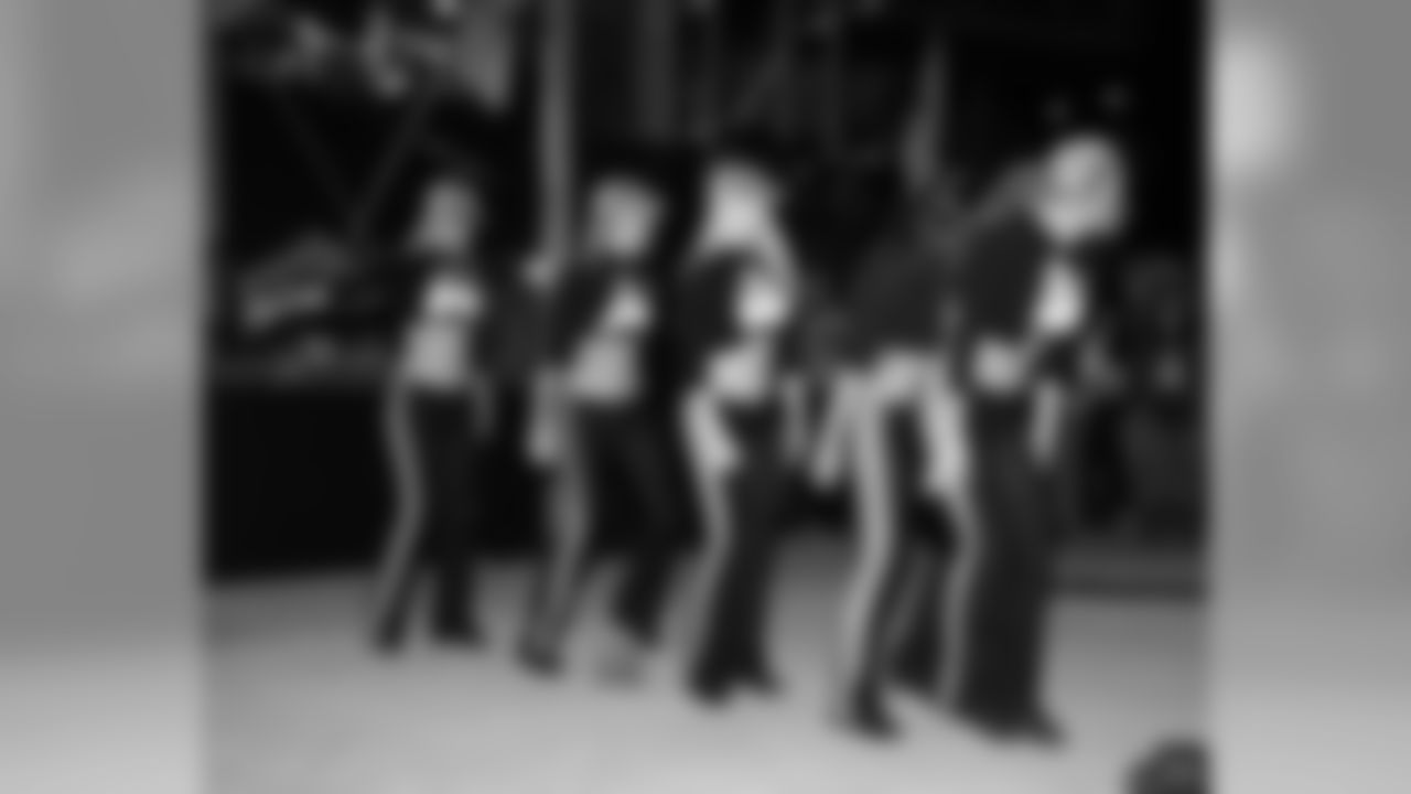 Five Eagles Cheerleaders who visited troops overseas earlier this year performed a cadence dance in the HeadHouse Plaza
