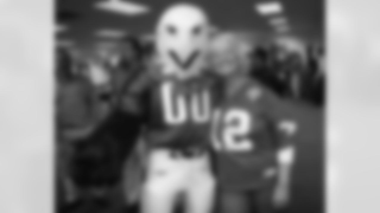 SWOOP with a fan sporting a throwback jersey