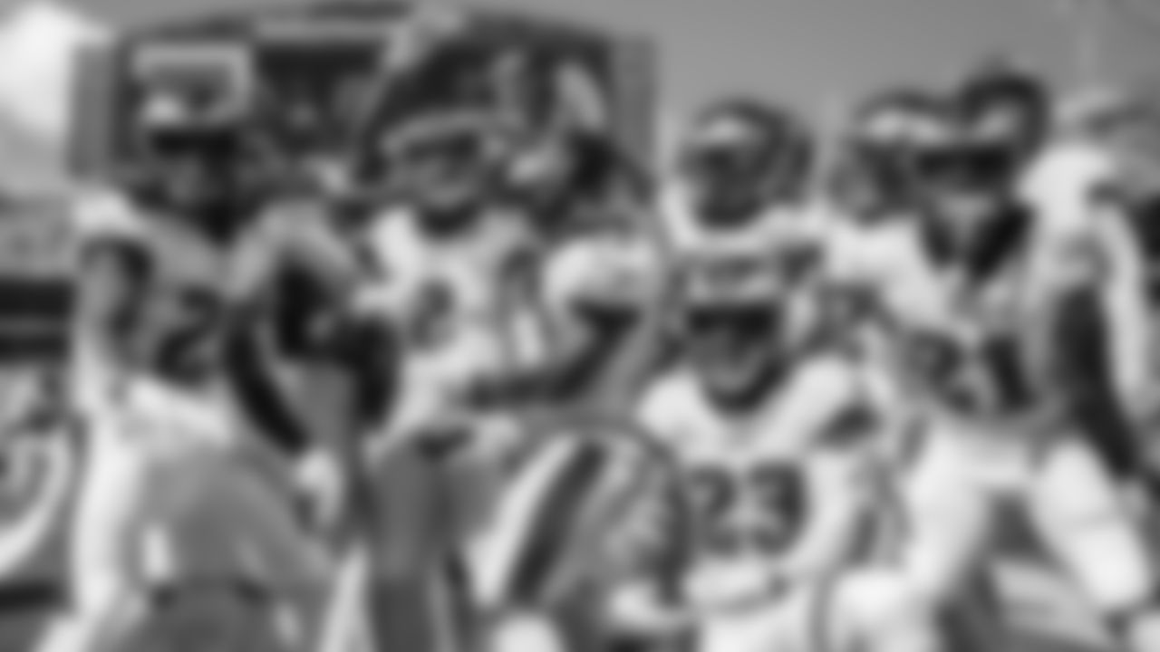 The defense celebrates an interception
