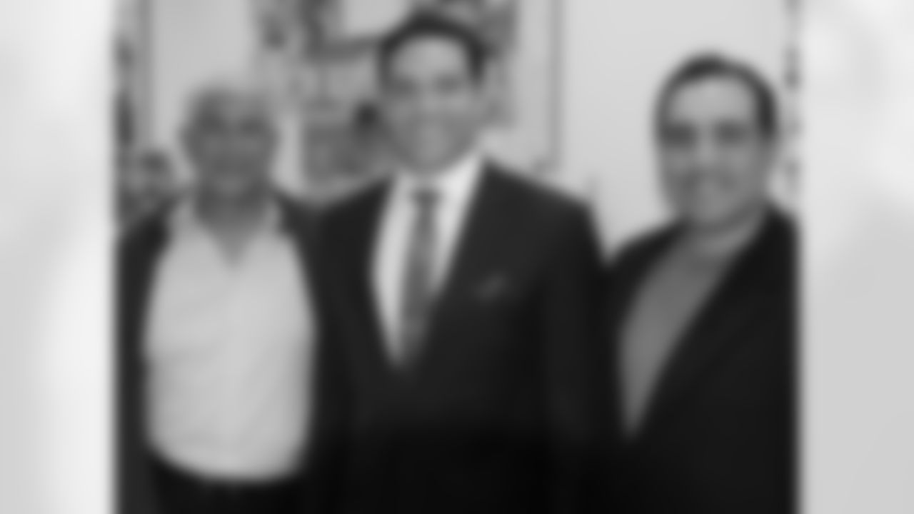QB Mark Sanchez with his father, Nick and his brother, Nick Jr.