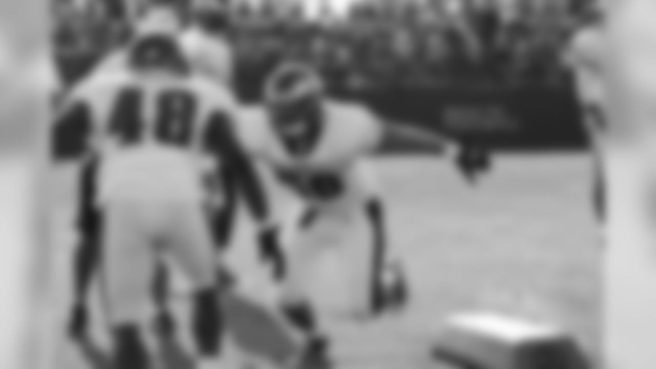 LB Casey Matthews hits teammate Brandon Peguese