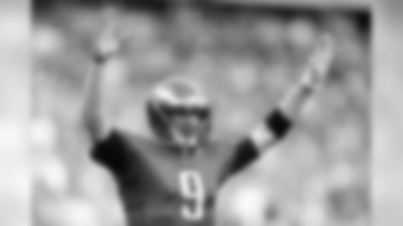 Eagles' QB Nick Foles celebrates after LeSean McCoy scores a touchdown.