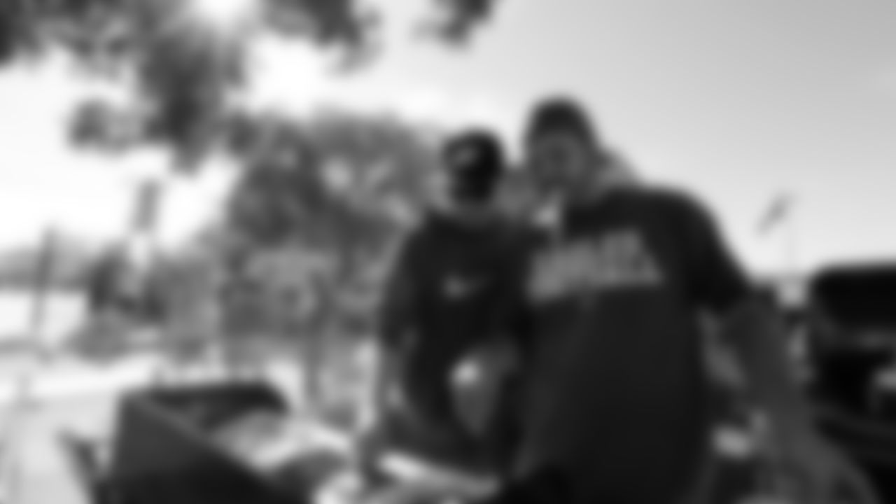 Eagles fans grill outside before the week two game against the Chargers.