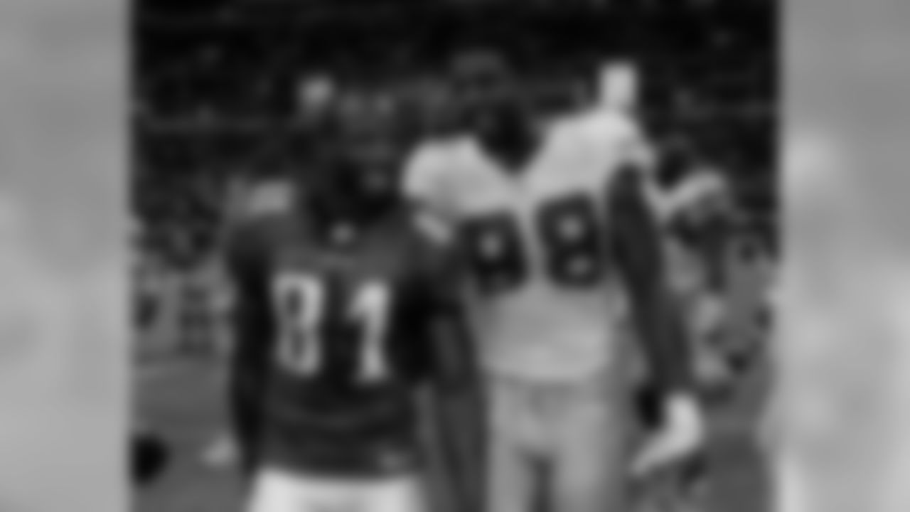 Post-game photo featuring WR Jason Avant
