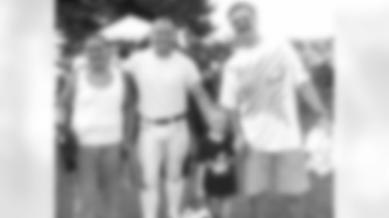 K David Akers poses for photo with Heather Sicher, Tim Kaercher and his daughter, Paige