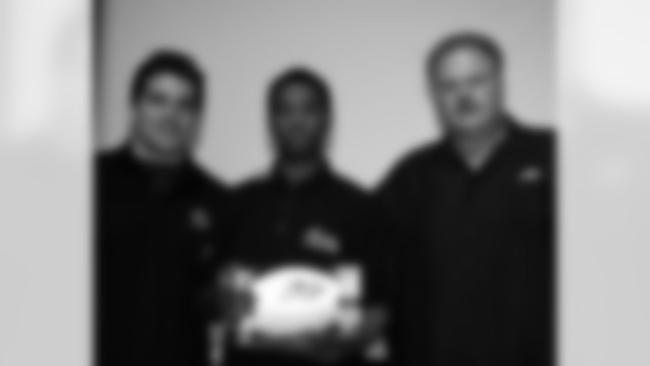 Steven Ferguson of Thomas A. Edison/John C. Fariera High School with Andy Reid and Kyle Eckel