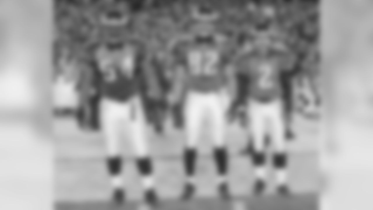 Game captains: Jeremiah Trotter, L.J. Smith and David Akers