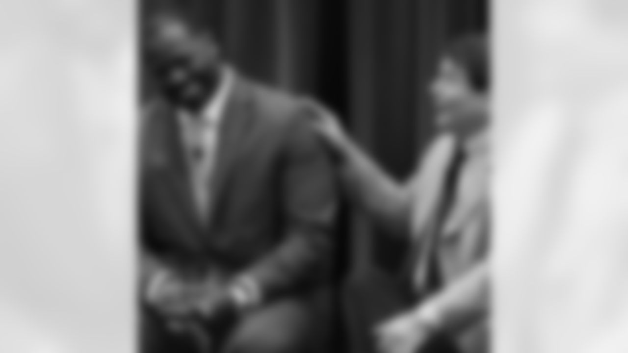 Merrill Reese and Jeremiah Trotter share a laugh