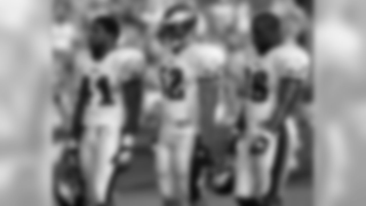 LBs Akeem Jordan, Craig Kobel and Omar Gaither look on