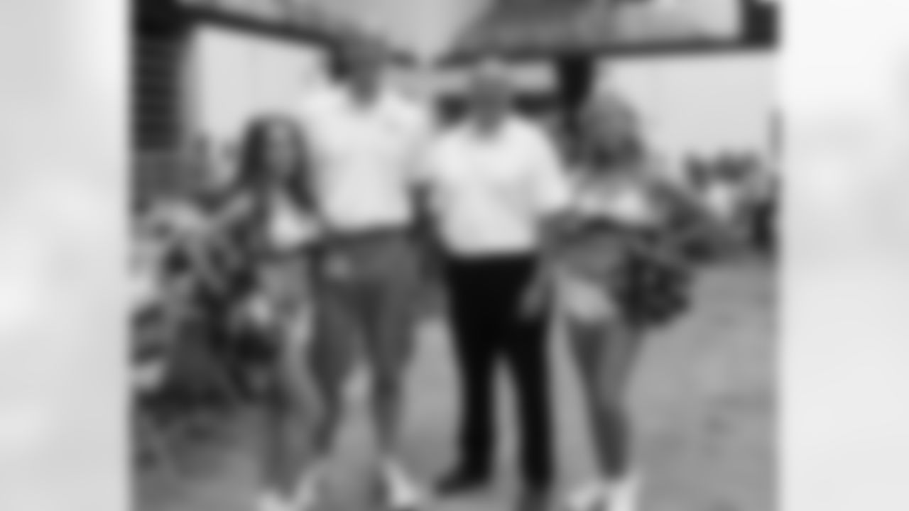 Cheerleaders Tracey and Monica with Robert Kessler and Mike Ruhl of The American Red Cross