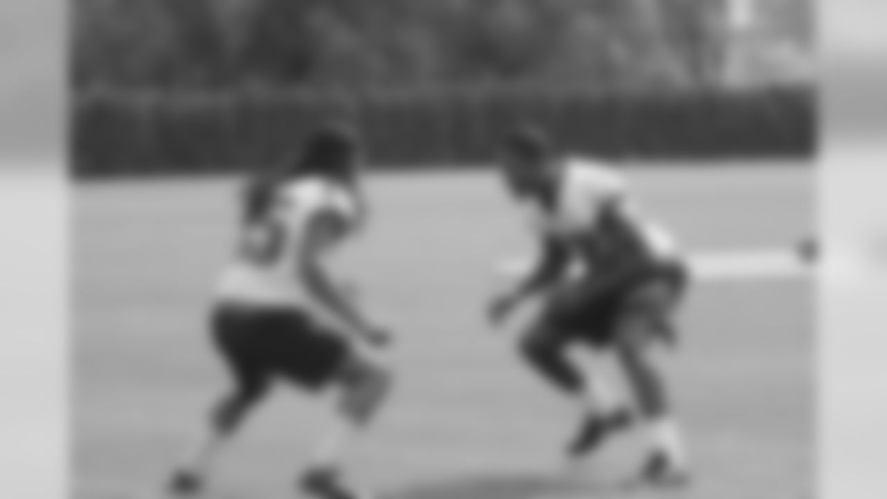 DBs Denzel Rice and Eric Rowe continue their pre-practice exercises