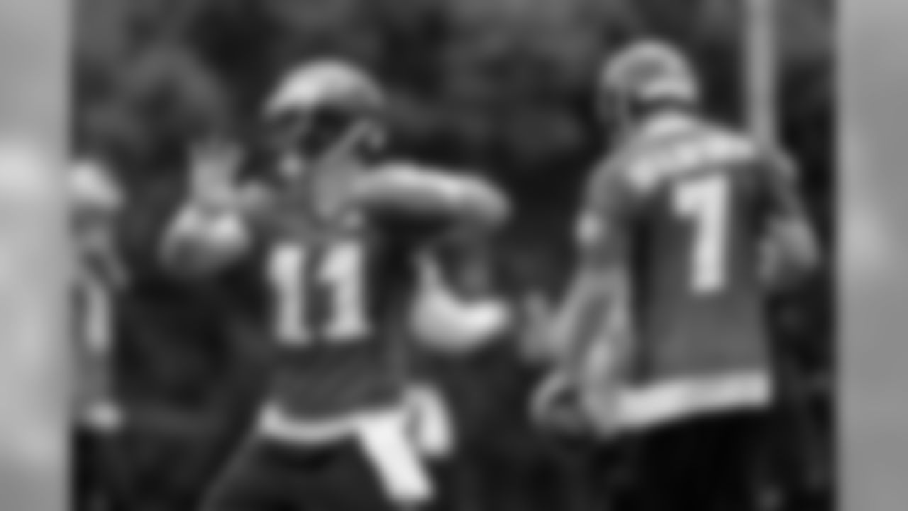 QBs Tim Tebow and Sam Bradford