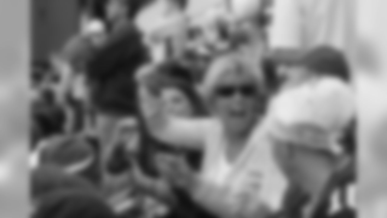 Fans in pink cheering on the Eagles!