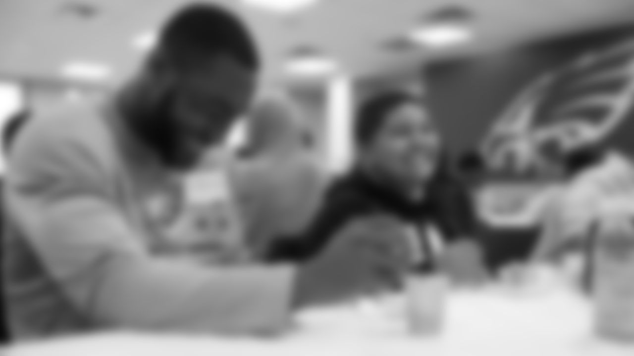 RB Miles Sanders couldn't contain his laughter during the event