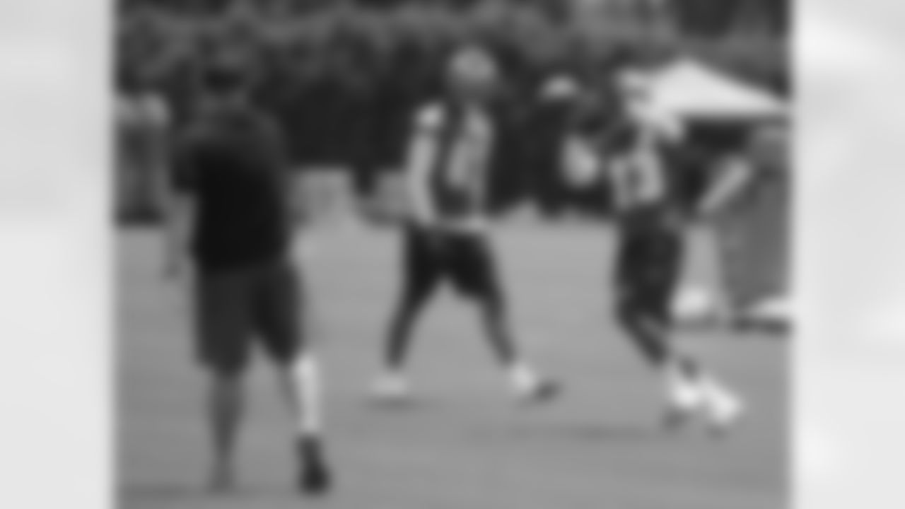 Chip Kelly throws the ball to wide receiver Josh Huff