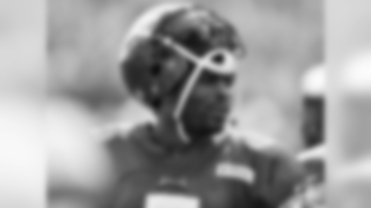 Quaterback Michael Vick looks on during training camp at Lehigh University on July 30, 2012 in Bethlehem, Pennsylvania.