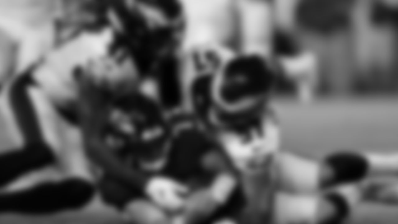 S Johnathan Cyprien and LB T.J. Edwards combining for a tackle