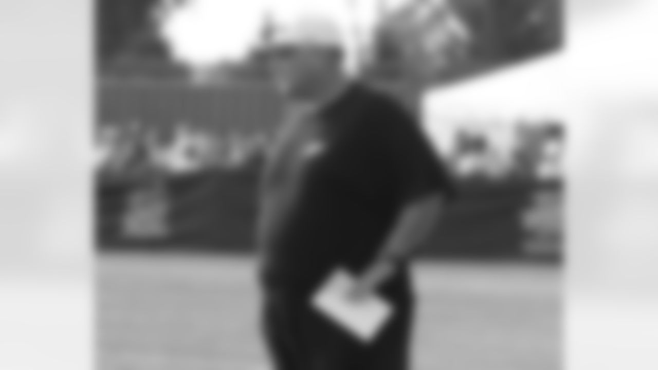 Head coach Andy Reid watches the team practice
