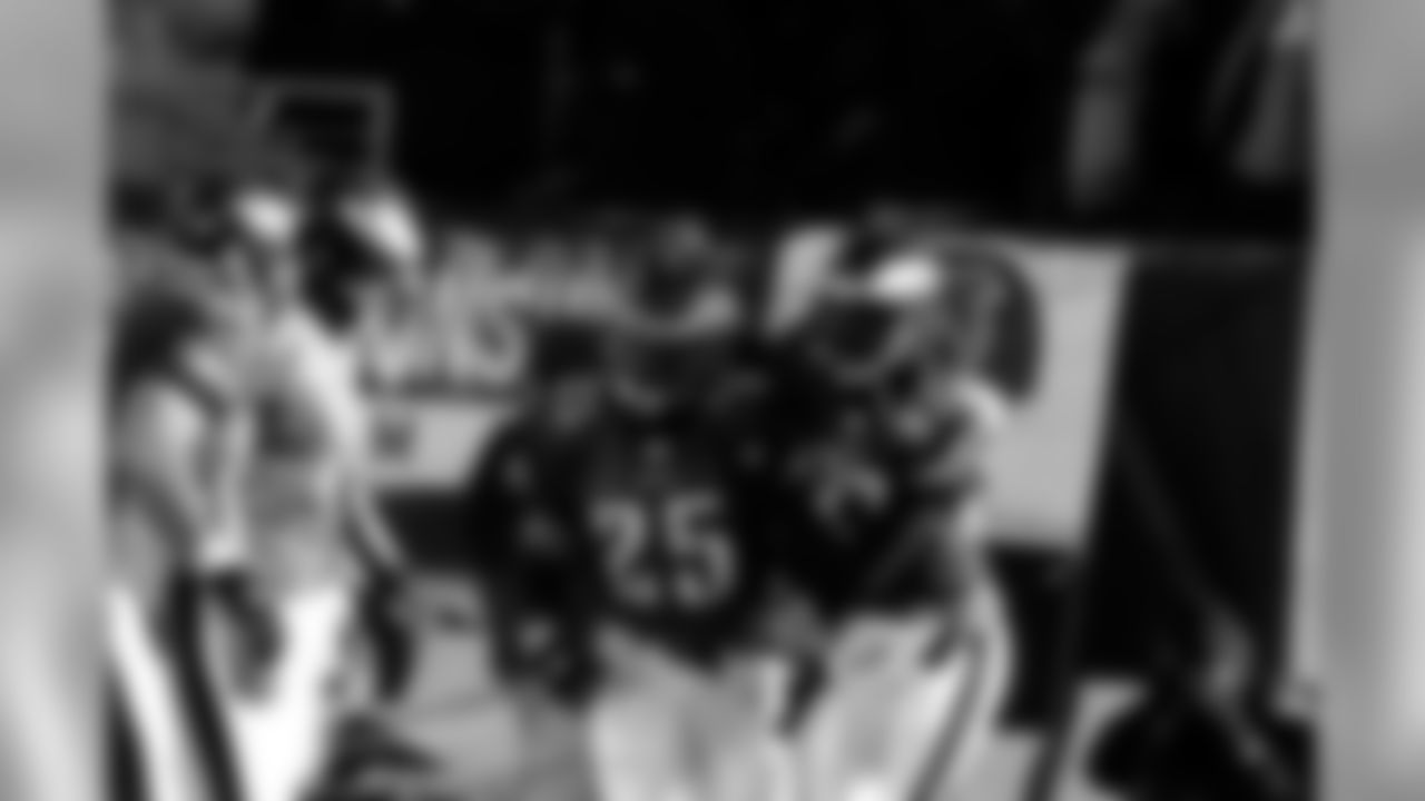 RB Dorsey Levens and WR Todd Pinkston celebrate after a great play