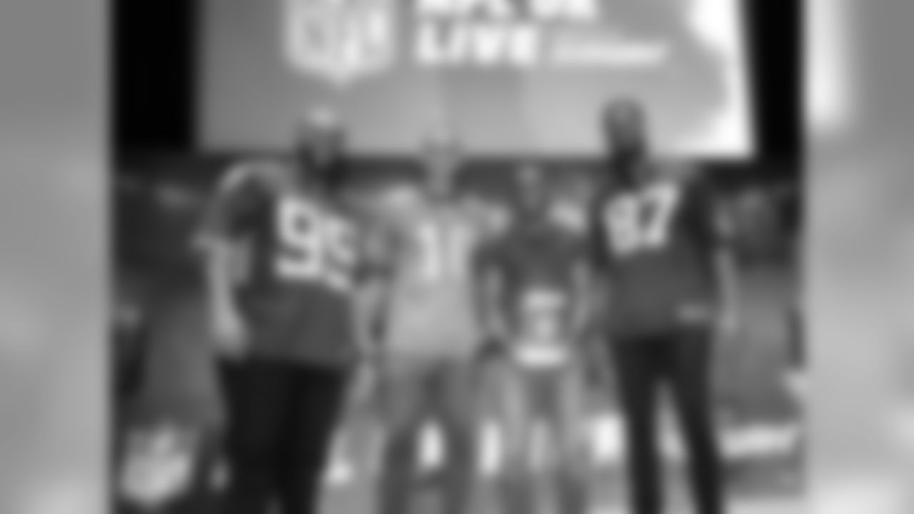 Mack Hollins with Jurrell Casey, Jared Cook and a lucky fan after the NFL UK live event.