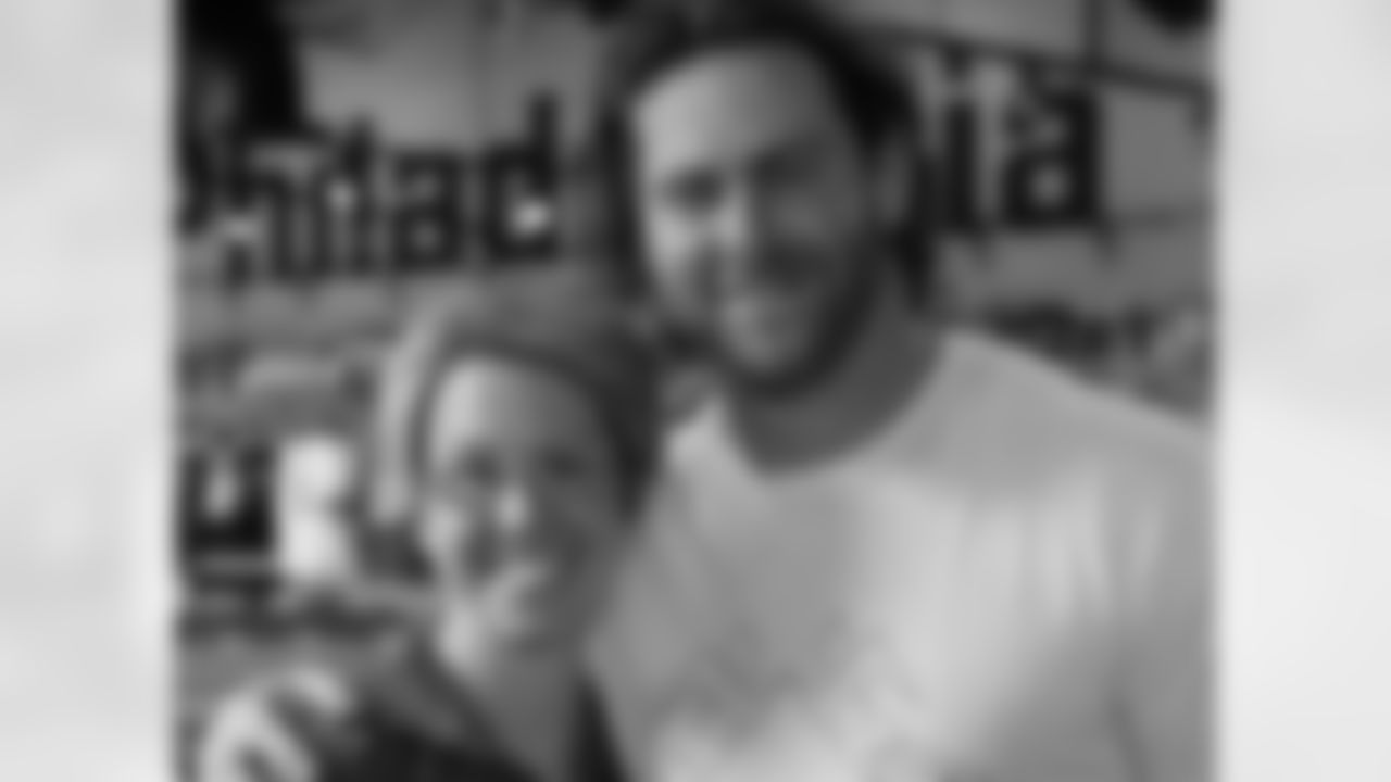 G Evan Mathis and Pro Shop manager Annie Bobbe