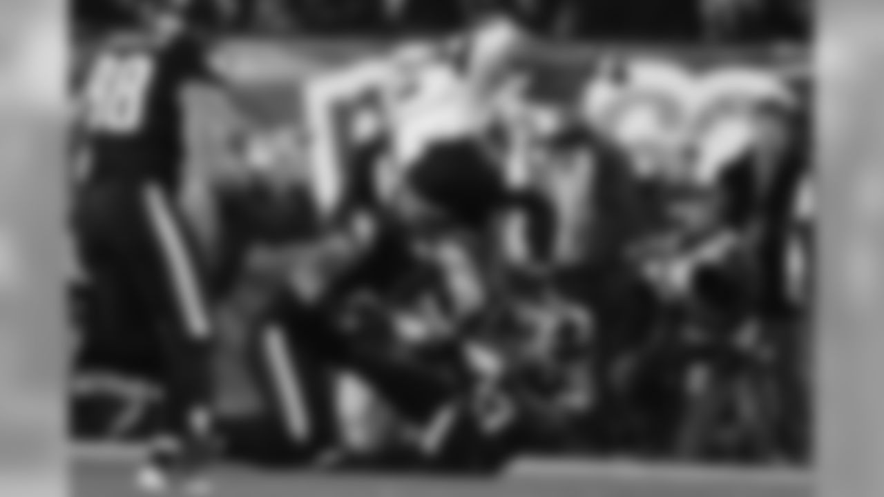 Players swarming the running back
