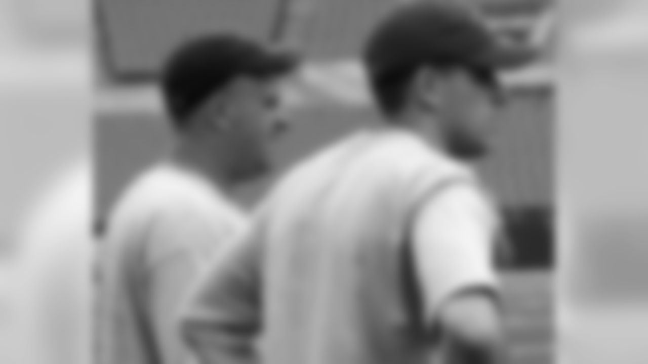 Frank Gumienny and Ryan Hughes look on