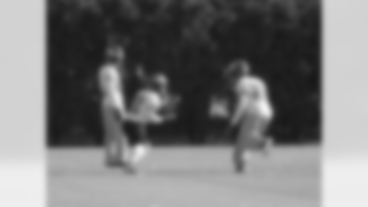 The Eagles defensive backs participate in a drill