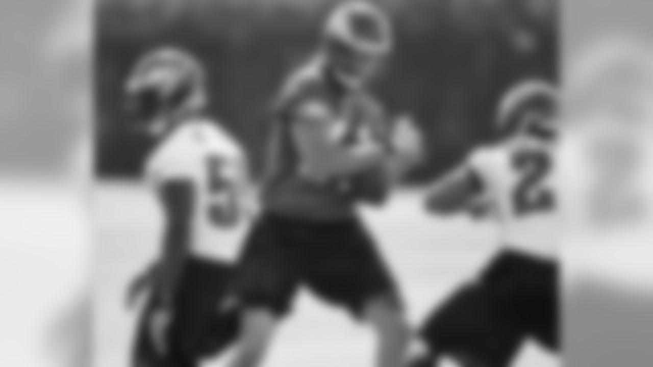 WR Riley Cooper between two defenders