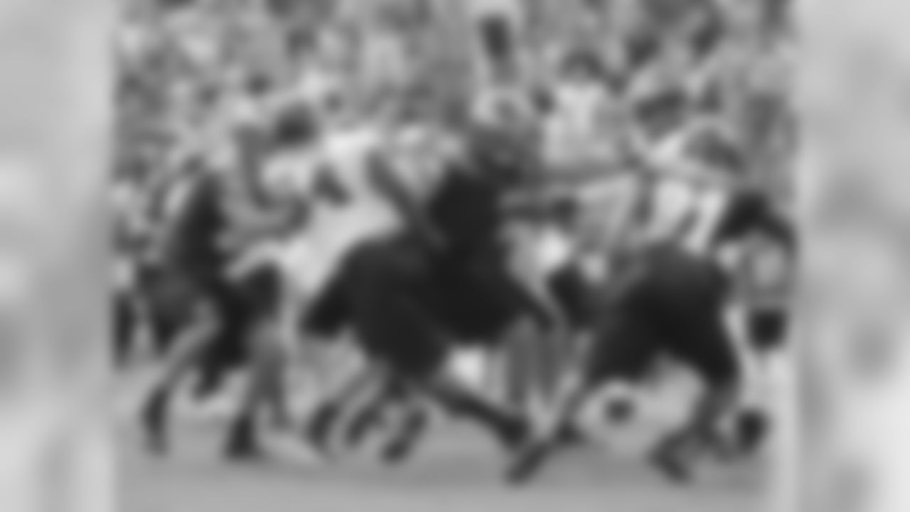 The offensive line tries to block DE Brandon Graham and the rest of the defense