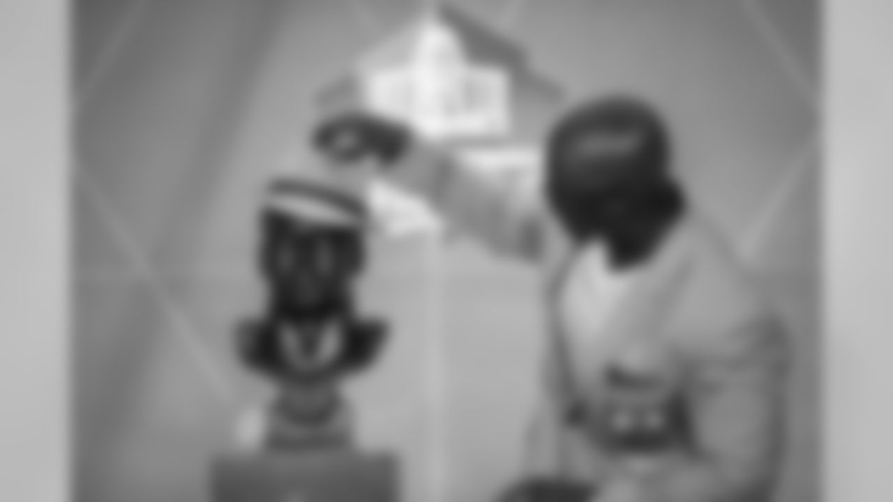 Brian Dawkins adds a little style to his bust