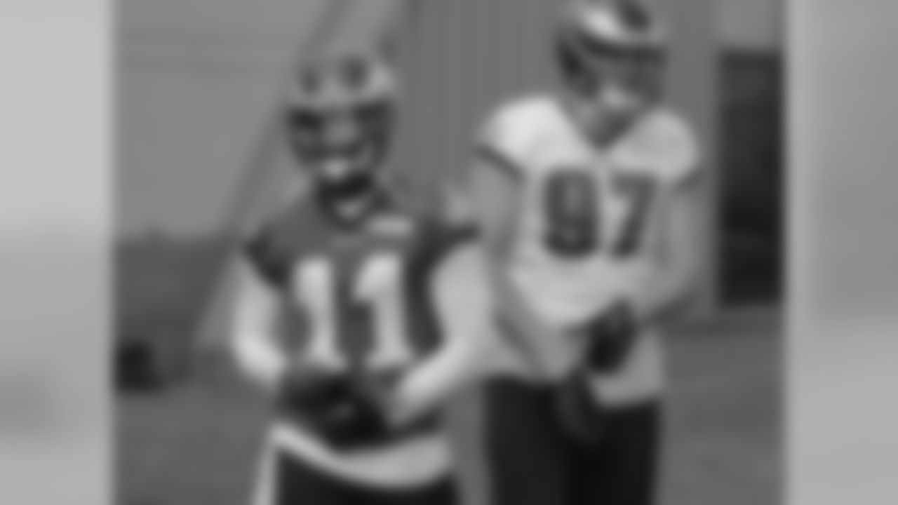 WR Josh Huff and DE Taylor Hart making their way out to practice