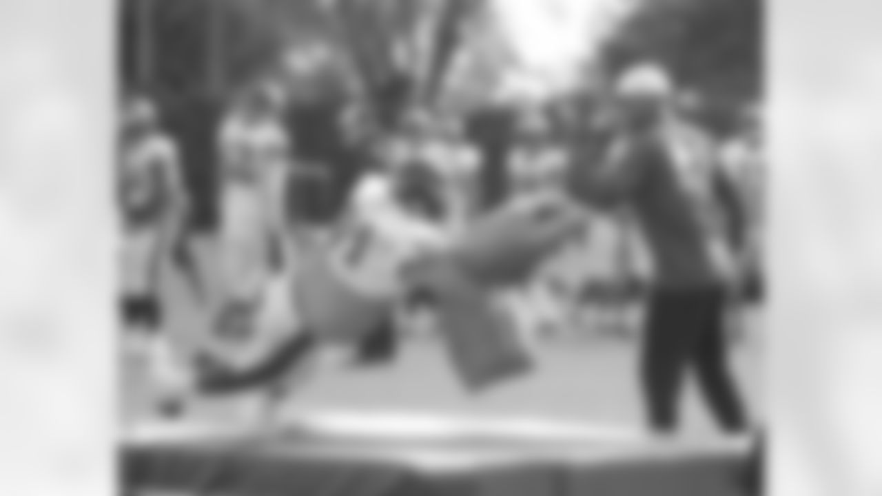 DE Fletcher Cox makes a hard tackle on the mats