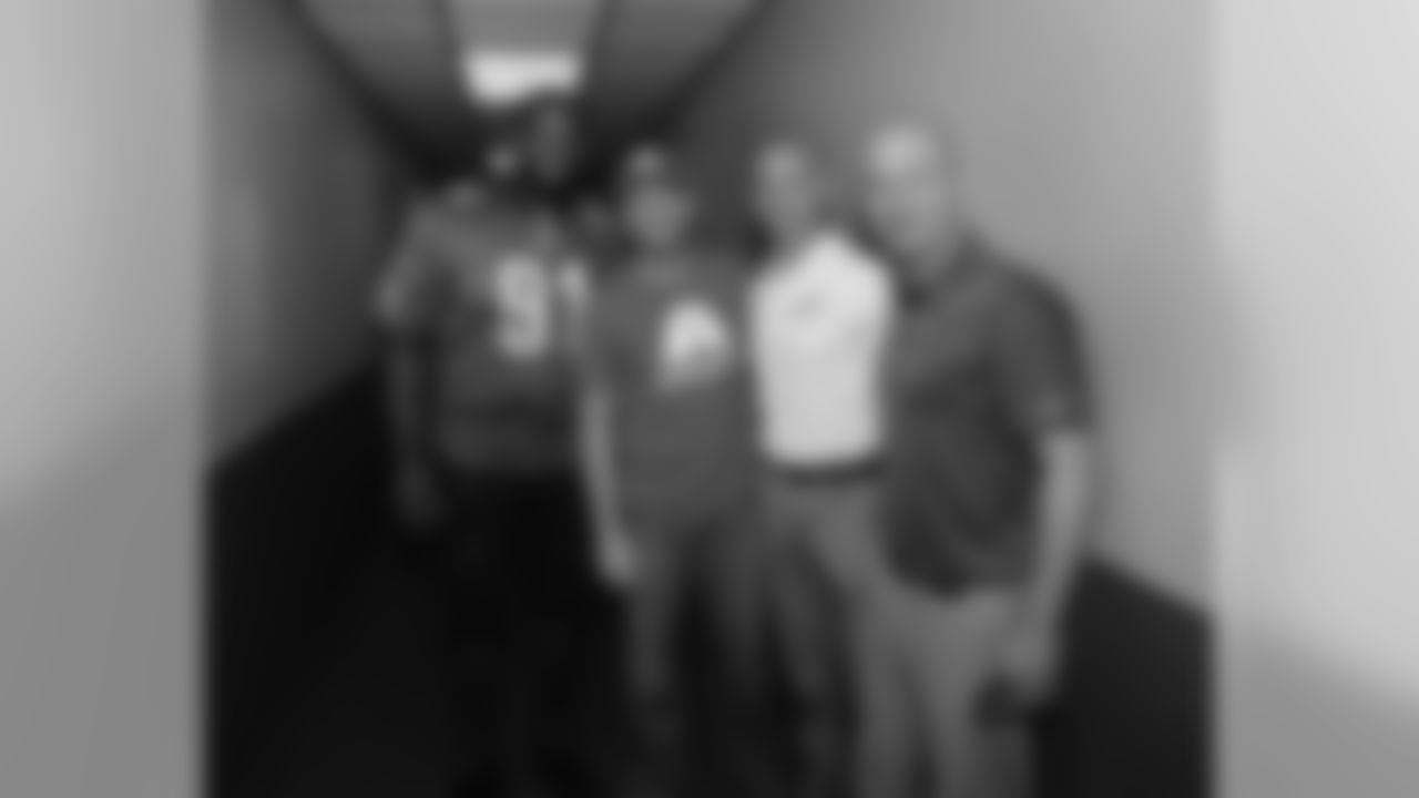 Eagles DT Fletcher Cox, Dale Earnhardt Jr., Eagles President Don Smolenski, and Eagles Senior VP of Business Ari Roitman the morning of the race.
