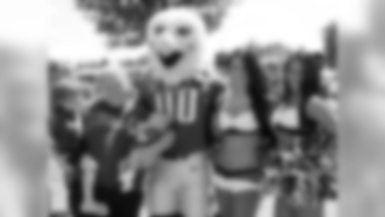 Smiles all around with SWOOP and the Eagles Cheerleaders