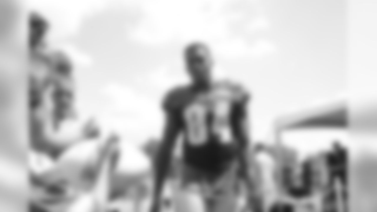 WR Mike Johnson spots his buddy in the crowd