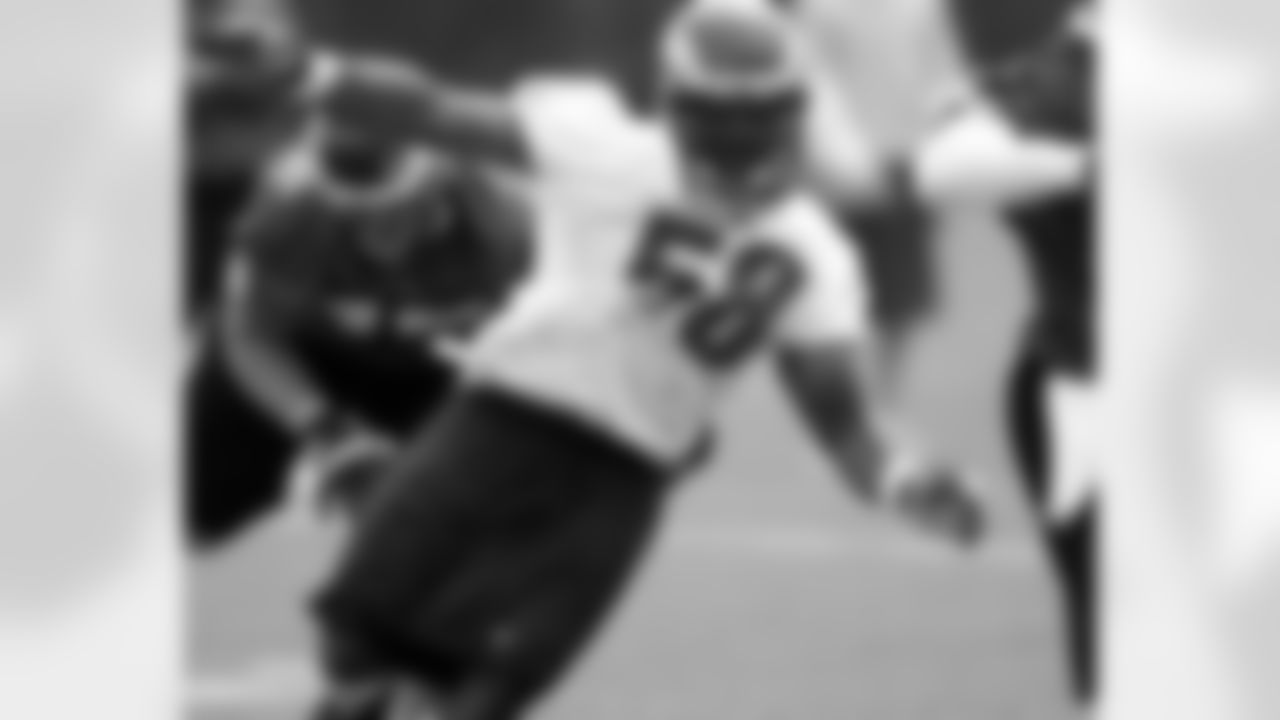 DE Trent Cole eyes up the QB in post-draft practice