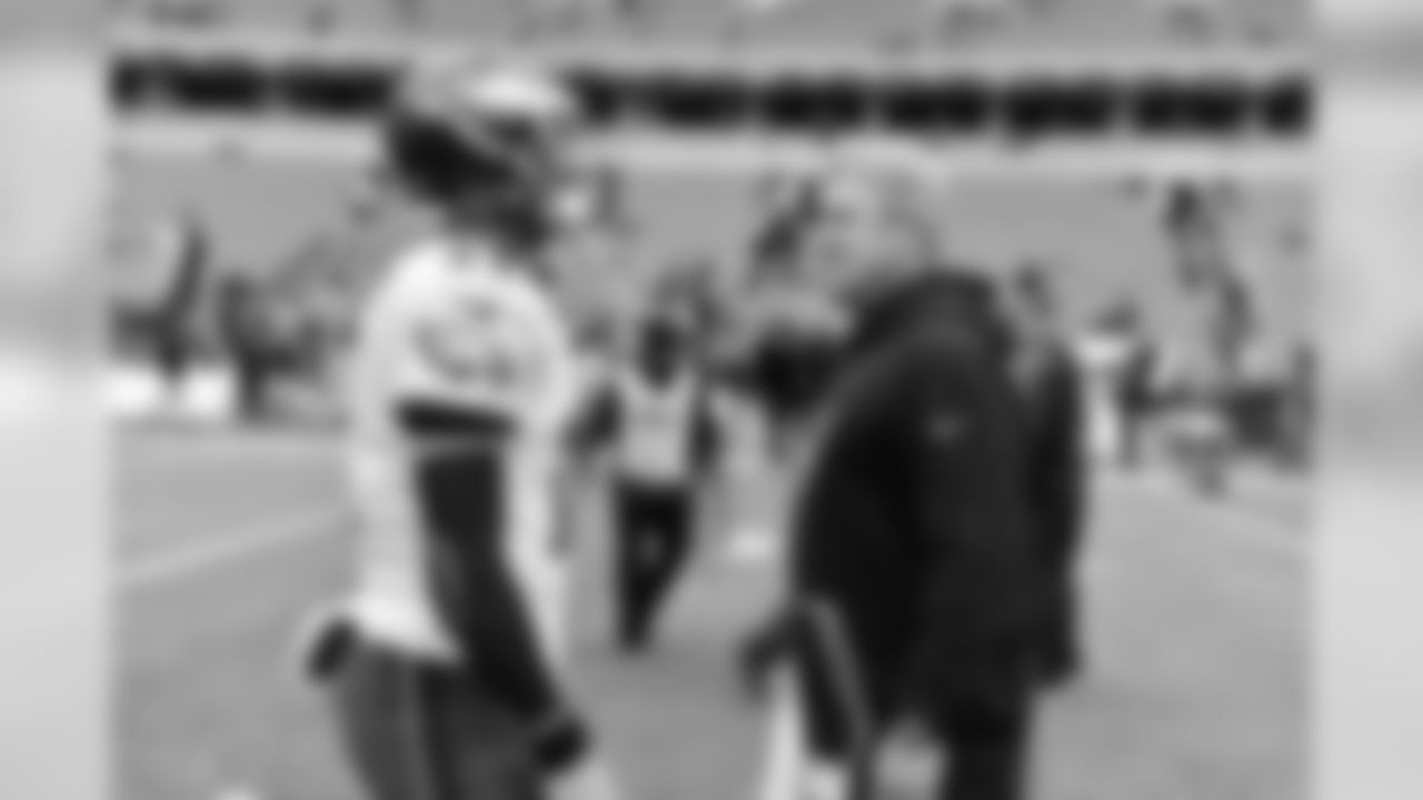 QB Carson Wentz with head coach Doug Pederson before the game.