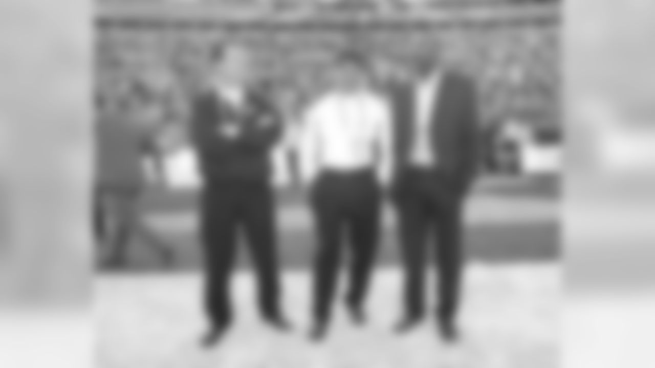 QB coach Pat Shurmur, OL coach Juan Castillo and Former Eagle Mike Quick